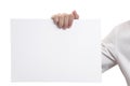 Business hand holding blank paper for presentation advertising Royalty Free Stock Photo