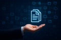 Business hand presenting digital file icon for cloud document sharing Royalty Free Stock Photo