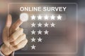 Business hand pushing online survey on virtual screen Royalty Free Stock Photo