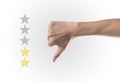 Business hand thumb down with yellow marker on five star rating. Royalty Free Stock Photo