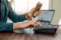 Business hands using telephone in office. Businessman dialing VoIP phone in the office