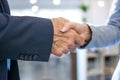 Business handshake on bright background. Royalty Free Stock Photo