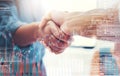 Business, handshake and collaboration on statistics double exposure. Shaking hands, deal and people with agreement on