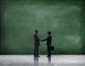 Business Handshake with Green Textured Background Royalty Free Stock Photo