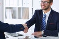 Business handshake at meeting or negotiation in the office. Partners are satisfied because signing contract or financial Royalty Free Stock Photo