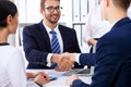 Business handshake at meeting or negotiation in the office. Partners are satisfied because signing contract or financial Royalty Free Stock Photo