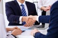 Business handshake at meeting or negotiation in the office. Partners are satisfied because signing contract or financial Royalty Free Stock Photo