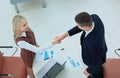 Business handshake in modern office