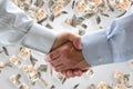 Business handshake with money background