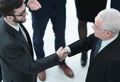 Business handshake and business people conce Royalty Free Stock Photo