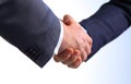 Business handshake. Two businessman shaking hands with each other in the office Royalty Free Stock Photo