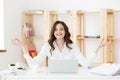 Business and Health Concept: Portrait young woman near the laptop, practicing meditation at the office desk, in front of