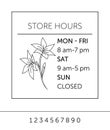 Business hours for cafe. Sticker with lilies on the window