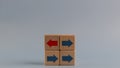 Business icons for innovative, solution, Unique, think different, and individual concepts, arrows on red wooden blocks individual
