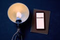 Business idea, individuality and creativity. Success and motivation. Vintage lamp, smartphone and notebook