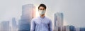 Business Impact from Coronavirus Concept. Portrait of Stressed Asian Man Wearing Medical Mask, Standing in City. looking at Camera Royalty Free Stock Photo