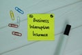 Business Interruption Insurance write on sticky notes isolated on office desk