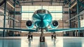 Business jet airplane is in airport hangar Royalty Free Stock Photo