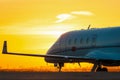 Business jet on the apron of aircraft. Dawn at Royalty Free Stock Photo