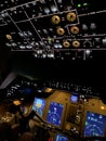 Business jet cockpit with modern instruments during night time