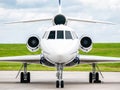 Business Jet Front with grass and sky