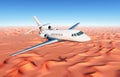 Business jet over the desert Royalty Free Stock Photo