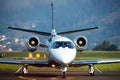 Business jet passenger plane at airport. Corporate flight travel. Aviation and aircraft. Vip transport. Company and Royalty Free Stock Photo