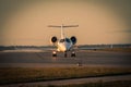 Business jet taxiing along the runway Royalty Free Stock Photo