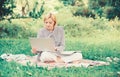 Business lady freelance work outdoors. Steps to start freelance business. Woman with laptop sit on rug grass meadow Royalty Free Stock Photo