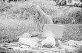 Business lady freelance work outdoors. Woman with laptop sit on rug grass meadow. Steps to start freelance business Royalty Free Stock Photo