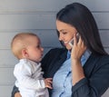 Business lady with her baby Royalty Free Stock Photo