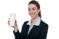 Business lady holding beverage Royalty Free Stock Photo