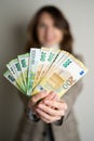 business lady holds euro bills in her hands Royalty Free Stock Photo