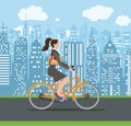 Business lady riding on a cruiser bicycle.