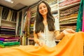 Business lady shop owner cashmere yak wool shawls.female seller in goa india