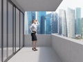 Business lady is standing on the balcony of the skyscraper and looking at the new business perspectives. Singapore panoramic Royalty Free Stock Photo