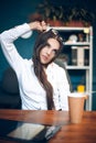 Business lady strangling herself with hair. Royalty Free Stock Photo