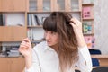 Business lady. Young beautiful girl in the office with documents Royalty Free Stock Photo