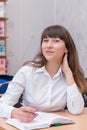 Business lady. Young beautiful girl in the office with documents Royalty Free Stock Photo