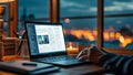 Hands using a laptop computer at night or in the dark, with a business article on the screen . Royalty Free Stock Photo