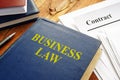 Business law book and corporate contract Royalty Free Stock Photo