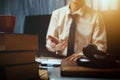 Business lawyer working hard at office desk workplace with book Royalty Free Stock Photo