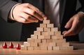 business leader, hand wooden cube, Businessman making pyramid