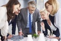 Business leader listening attentively coworkers speech