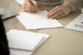 Business leader signing contract document at desk Royalty Free Stock Photo