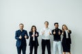 Business leaders with employees group showing thumbs up looking at camera, happy professional multicultural office team people Royalty Free Stock Photo