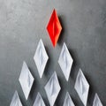 Business leadership Concept,key opinion Leader, the concept of influence. One red paper boat as the Leader, leading in the Royalty Free Stock Photo