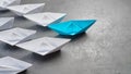 Business leadership Concept, Paper Boat, the key opinion Leader, the concept of influence. One blue paper boat as the Leader, Royalty Free Stock Photo