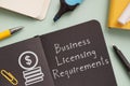 Business licensing requirements is shown on the photo using the text Royalty Free Stock Photo