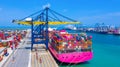 Business logistics import export, Container cargo ship in seaport terminal with blue sky background, Container cargo vessel